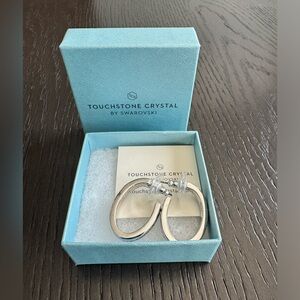 Touchstone Crystal by Swarovski NWOT - elongated hoops with dark gray crystals.